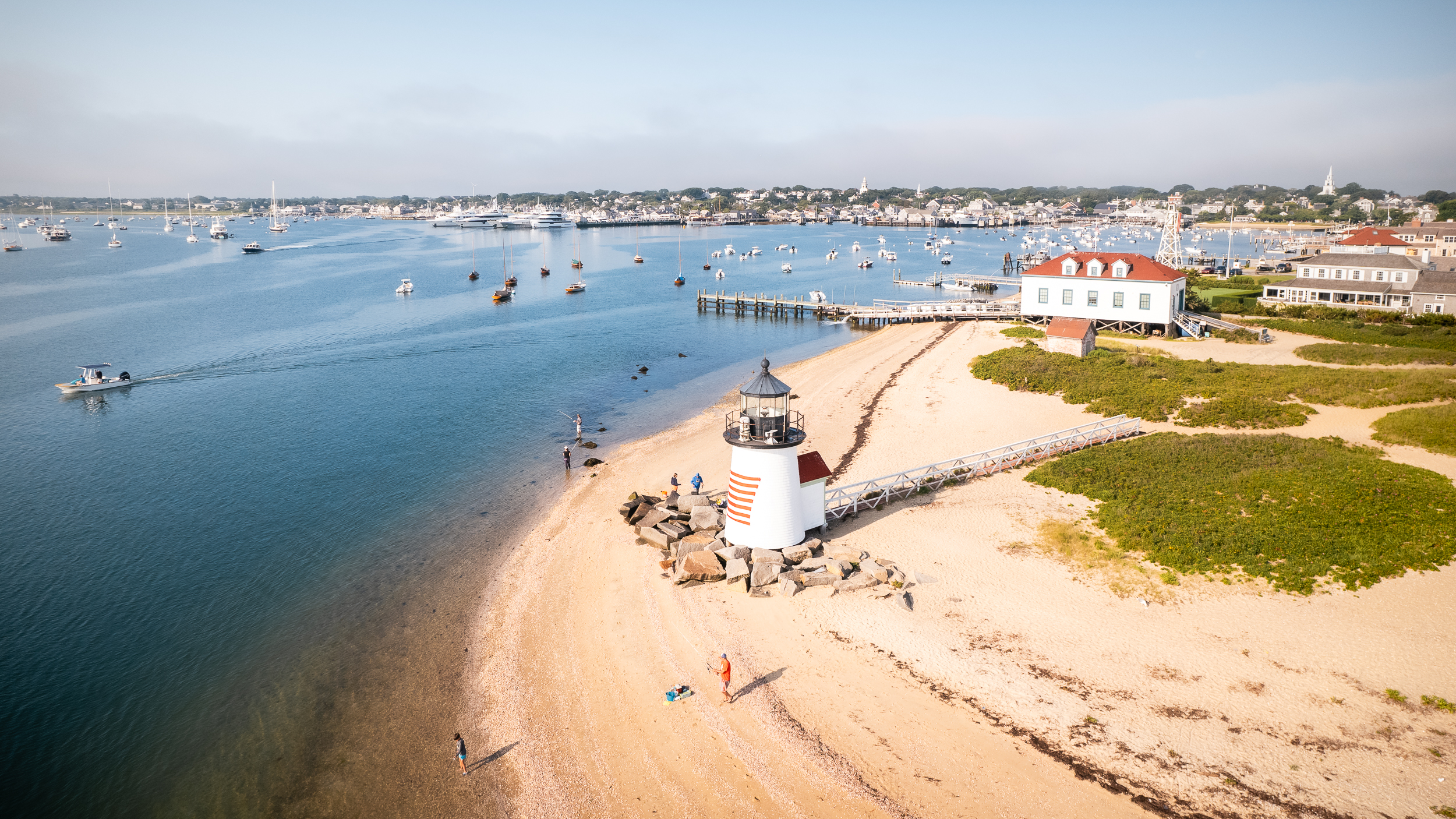 Brant Point lighthouse and Nantucket harbor aerial view